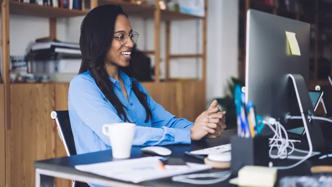 Happy woman on computer