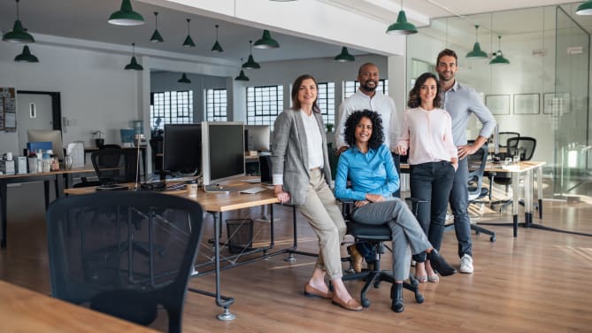 Coworkers smiling at camera