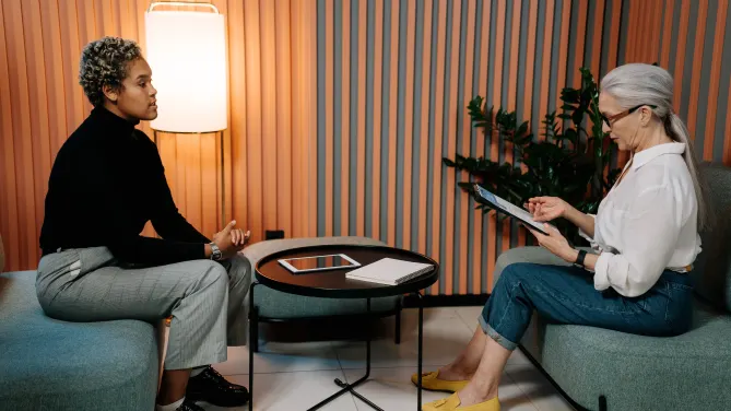 women in an informational interview