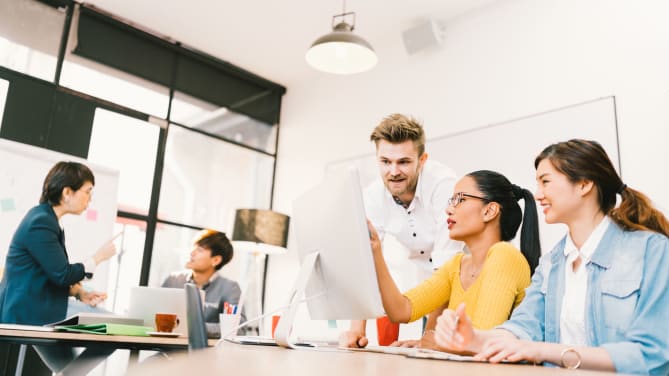 Diverse employees in a row