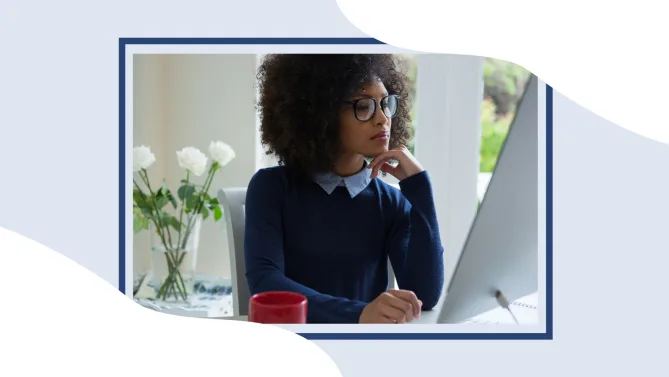 woman thinking at desk