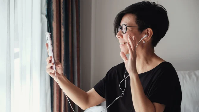woman making facetime video calling with smartphone