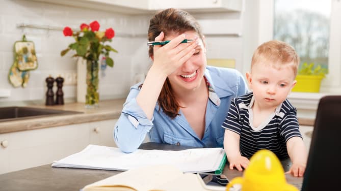 working mom with her baby