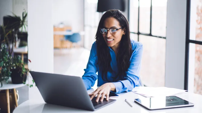 woman searching for jobs on her laptop