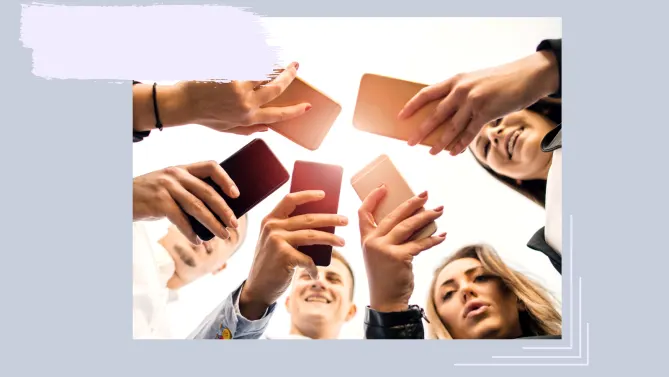 a group of people on their phones