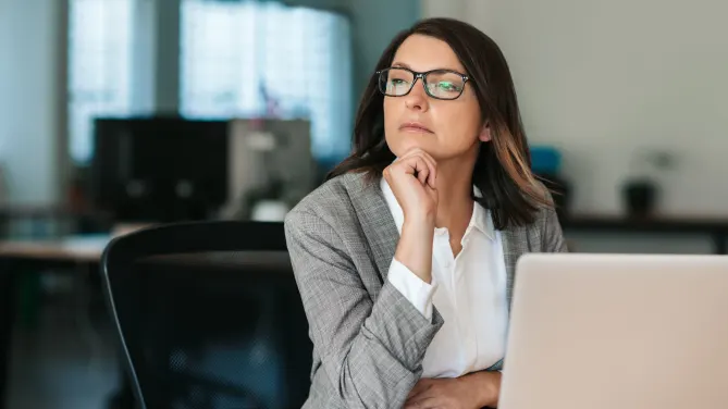 woman thinking at work