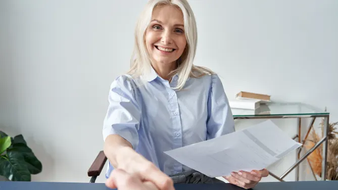 woman shaking hands