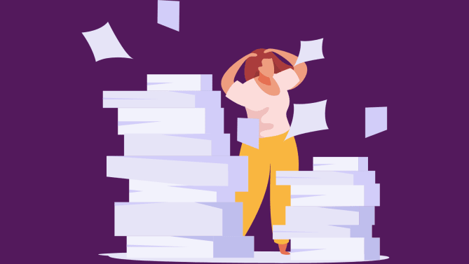 woman stressed with piles of work