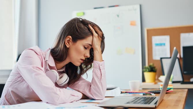 woman with low self-confidence at work