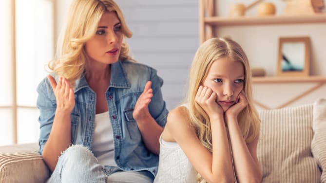 young girl with an attitude and mother scolding