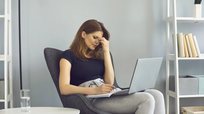 Frustrated woman on video call