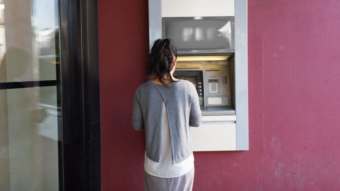 Woman at ATM