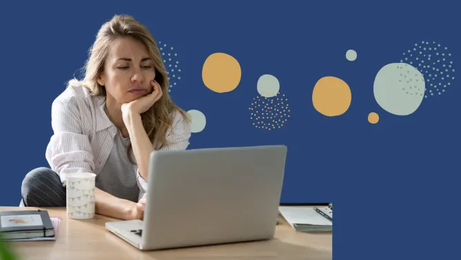woman looking stressed at work