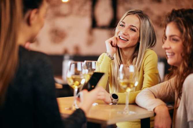 Women talking at networking event