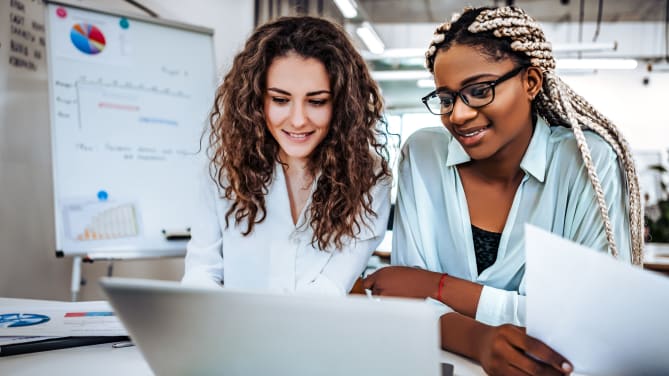 Two women at work