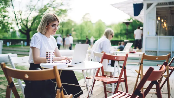 woman looking at laptop