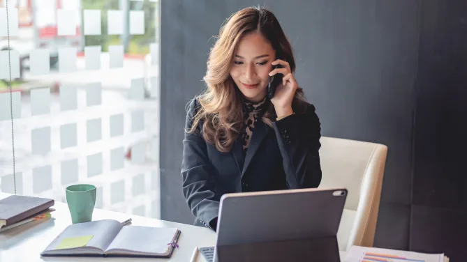 Woman smiling and working