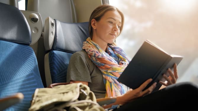 woman reading on the couch