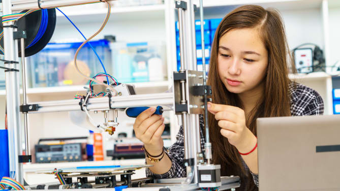 girl in robotics class