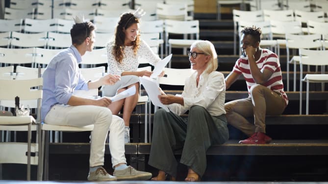 dramaturg reading script with other theatre professionals