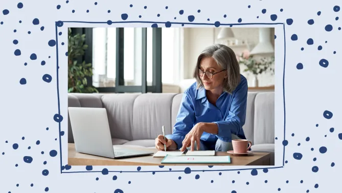woman writing at desk
