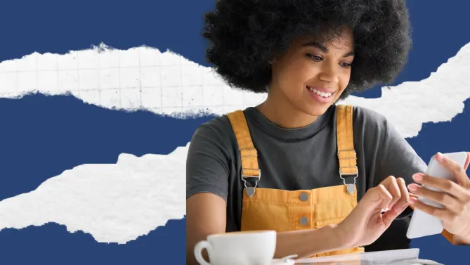 woman looking at phone smiling