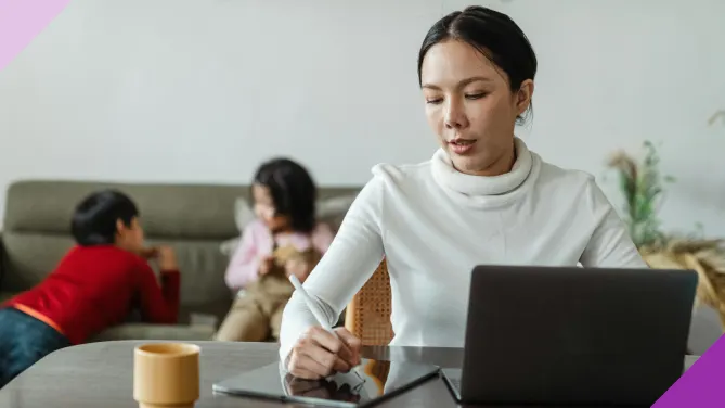Woman working from home, illustrating the pros and cons of remote work