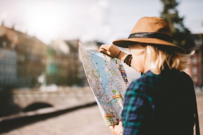 Woman Holding Map