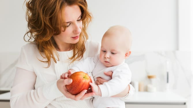 Mother watching video with children