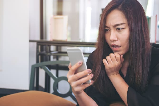 Stressed woman with phone