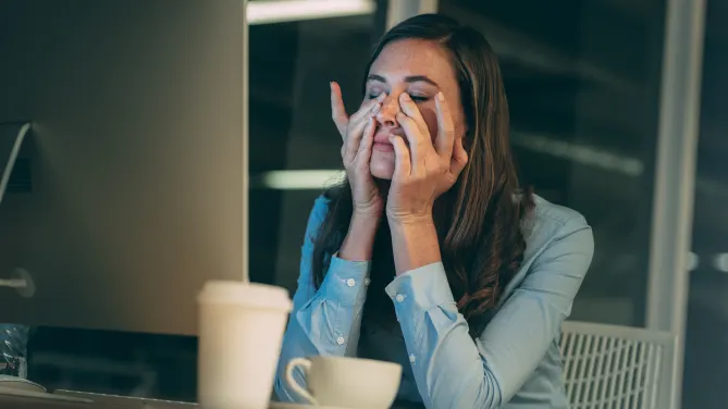 stressed woman working late