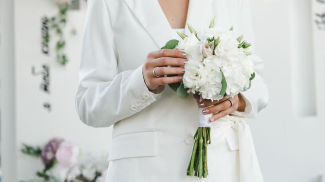 bride wearing suit