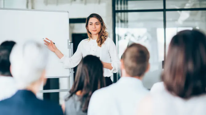 A photo of a woman presenting. Photo courtesy of Fannie Mae.