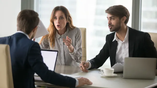confused man and woman at work 