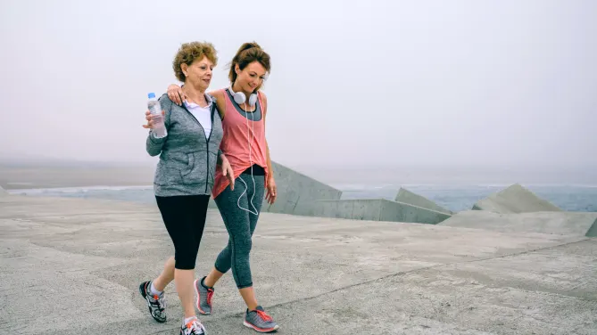 Woman and mother walking