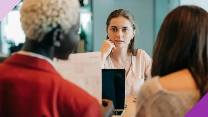 Professional in a face-to-face meeting, illustrating how to ask for a letter of recommendation