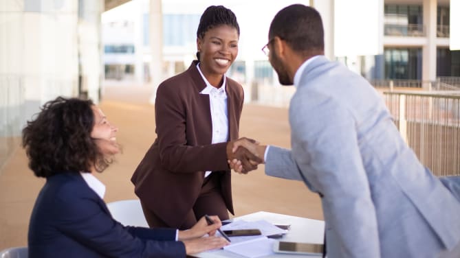 businesspeople shaking hands