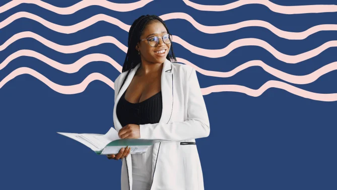 a woman holding papers at work