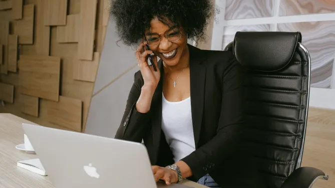 woman on the phone smiling