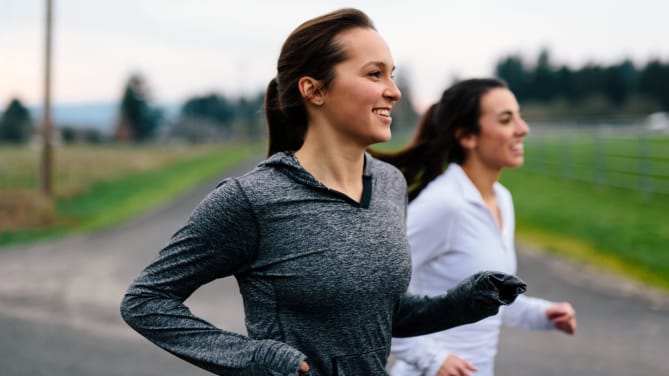 two women running outside