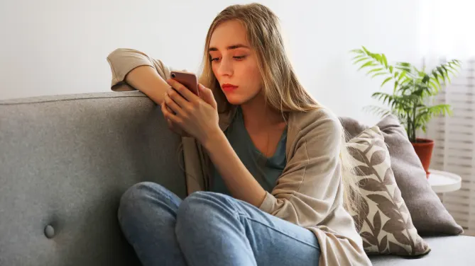 Woman holding phone