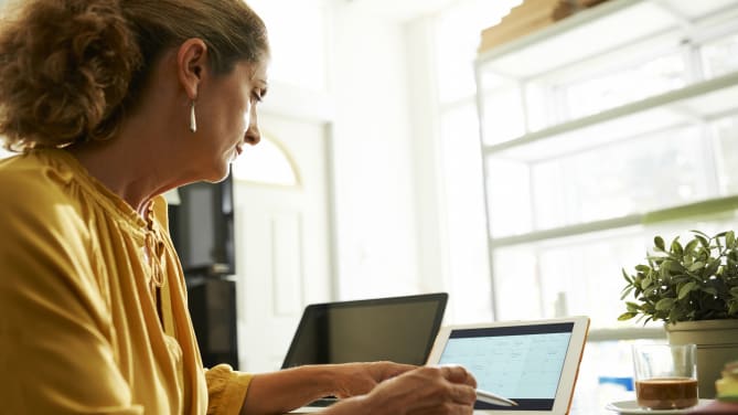 woman writing check
