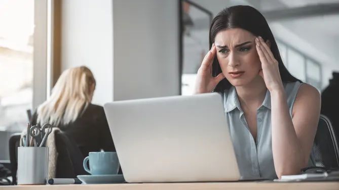 Stressed woman at work