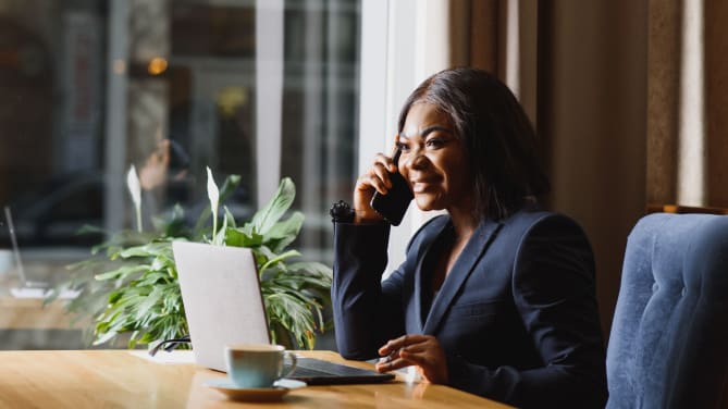 woman talking on the phone at work
