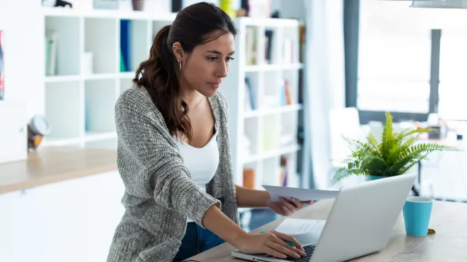 Serious woman on laptop
