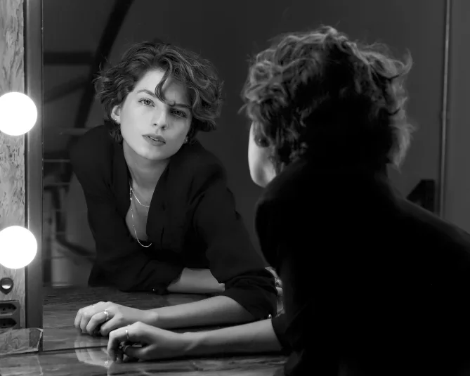 Do you recognize that woman in the mirror?