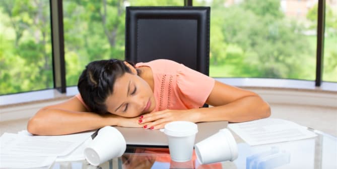 Woman asleep at desk