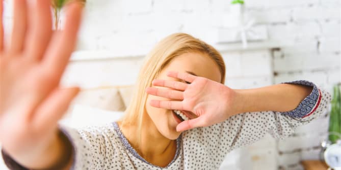 Woman covering face