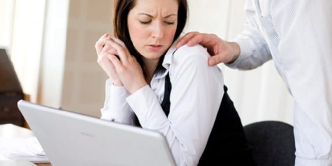 Woman being harassed at work