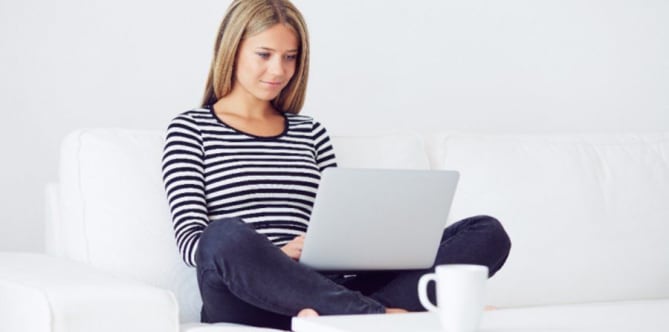 woman writing cover letter